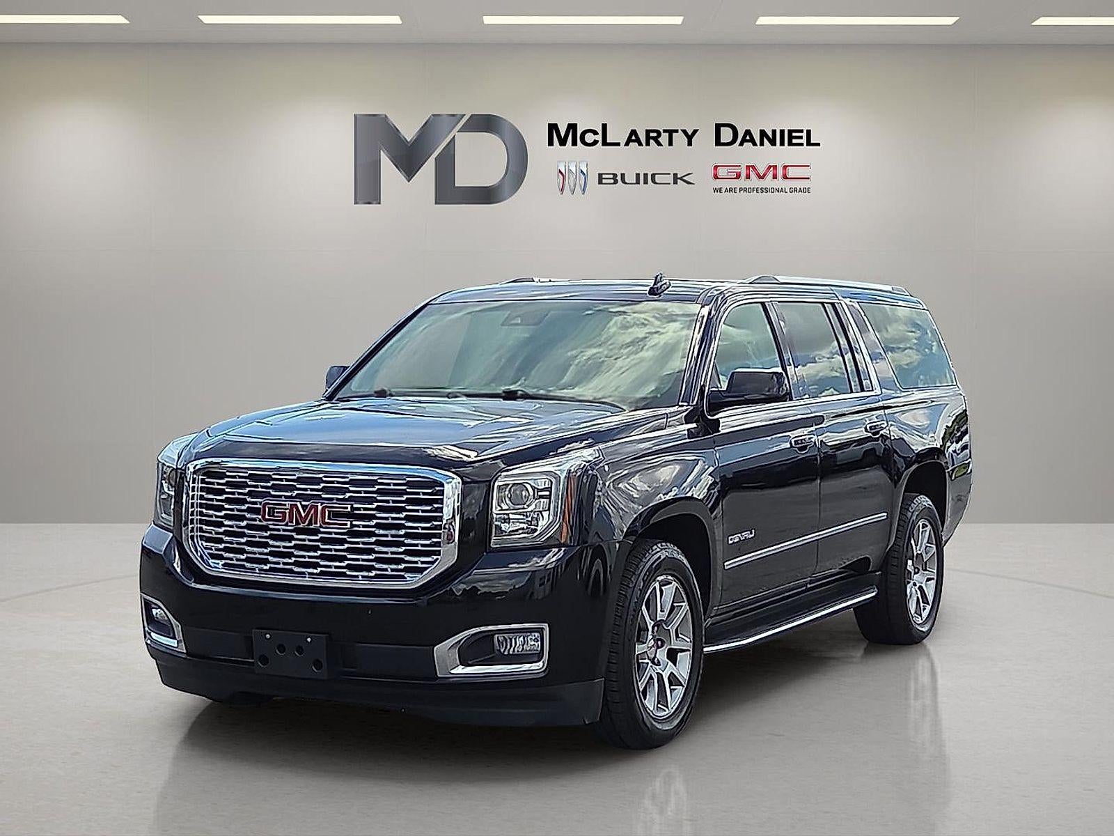 2019 GMC Yukon XL — rear three-quarter view
