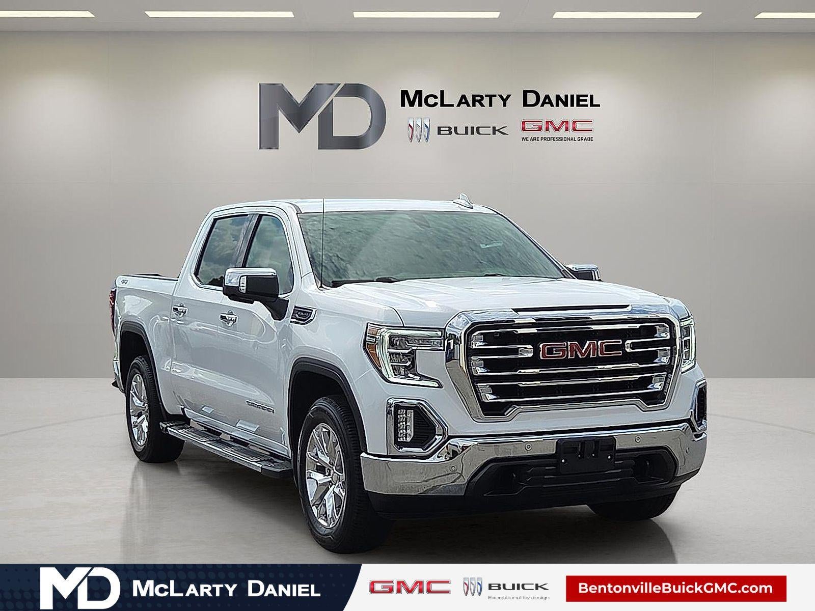 2021 GMC Sierra 1500 SLT in Summit White — front three-quarter view