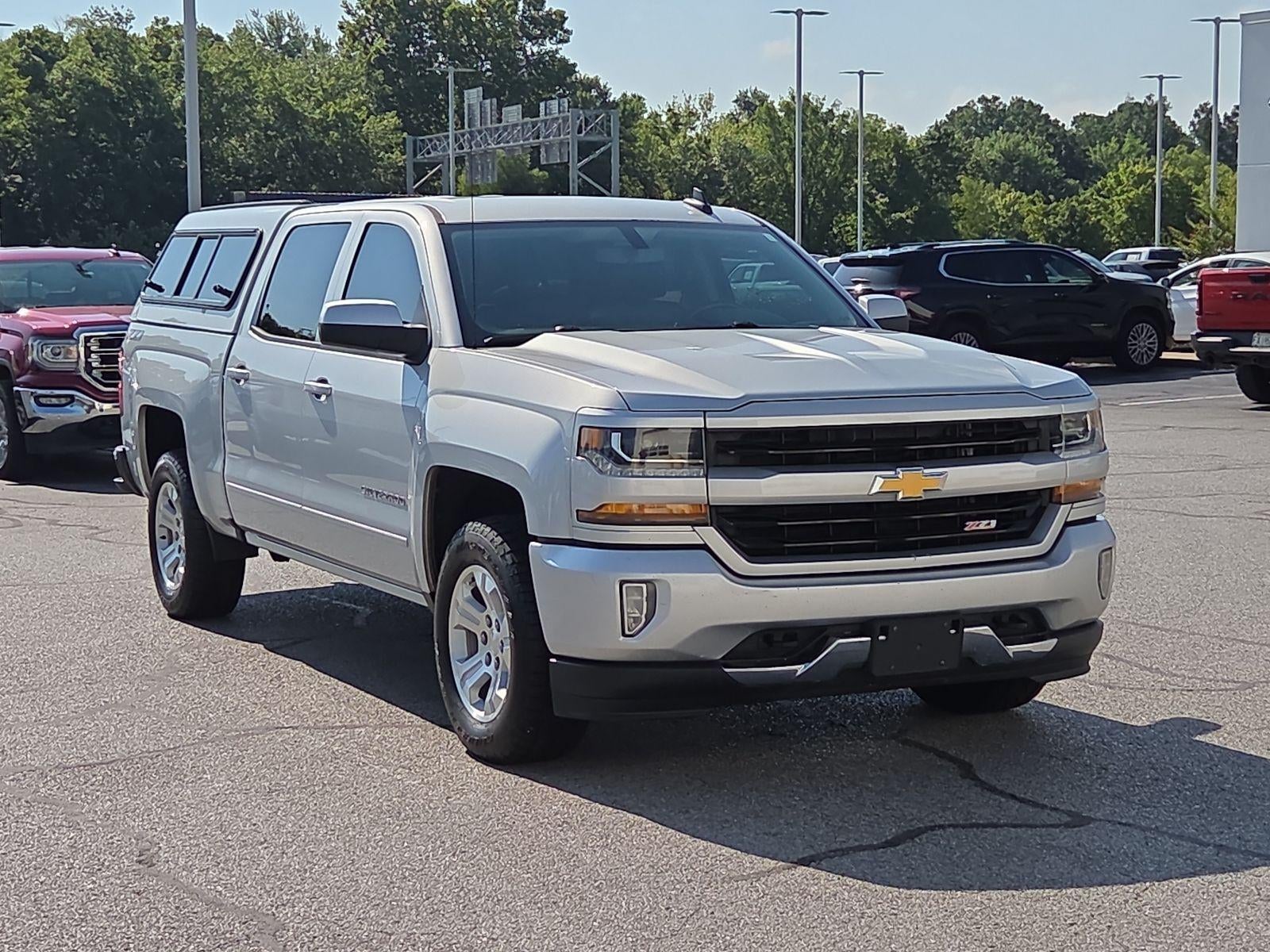 2018 Chevrolet Silverado 1500 LT in Silver Ice Metallic — front three-quarter view