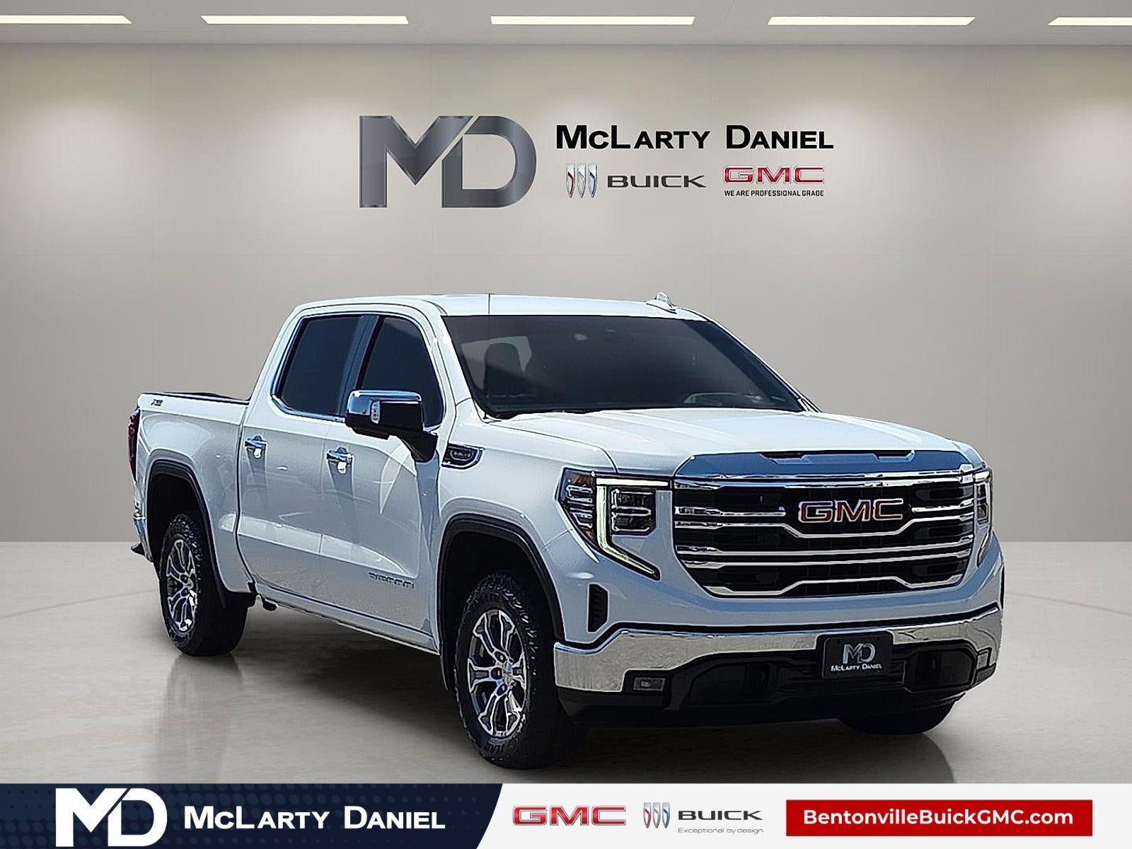2024 GMC Sierra 1500 SLT in Summit White — front three-quarter view