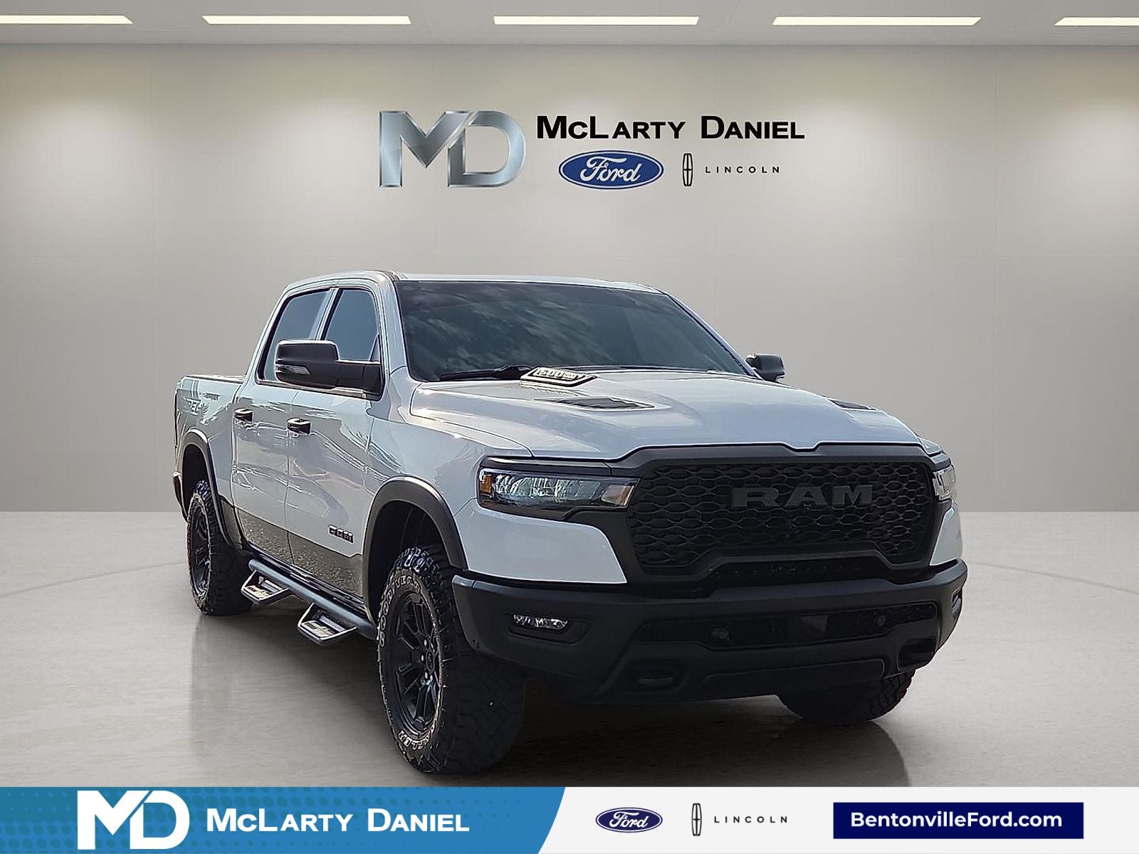 2025 RAM 1500 Rebel in Bright White Clearcoat — front three-quarter view