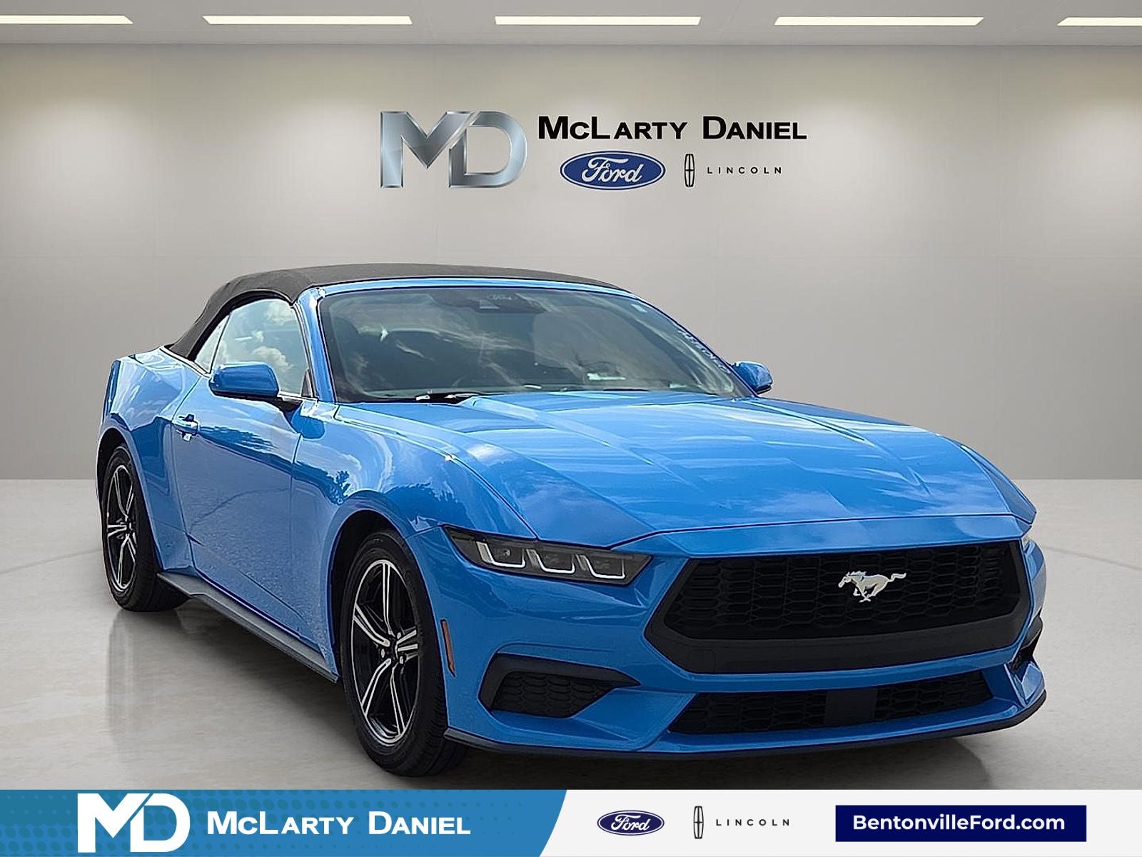 2025 Ford Mustang EcoBoost in Grabber Blue Metallic — front three-quarter view