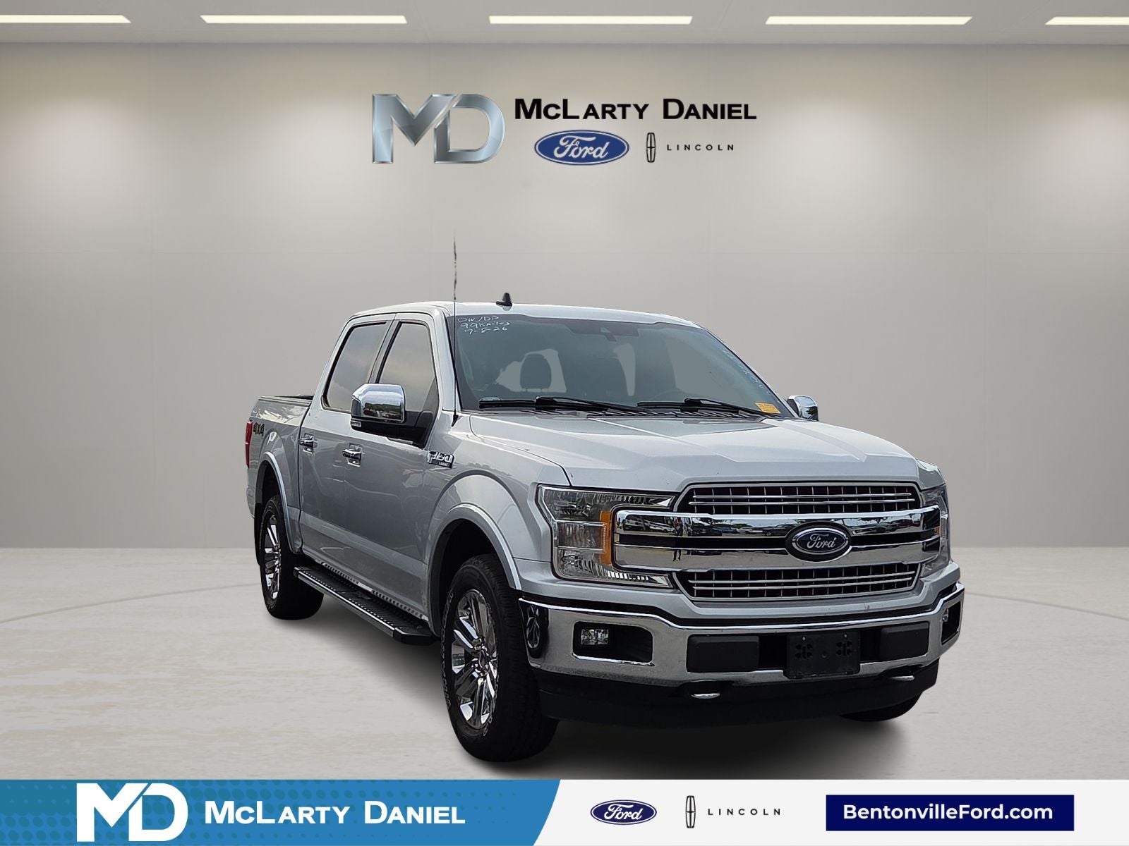 2019 Ford F-150 Lariat in Ingot Silver — front three-quarter view