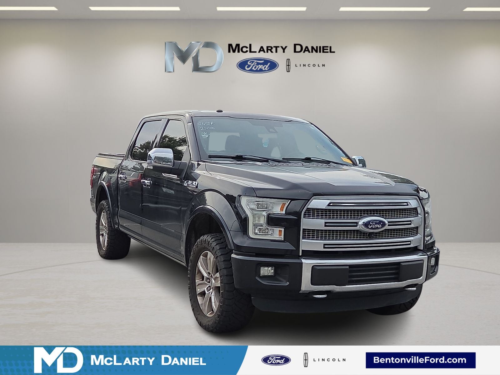 2016 Ford F-150 XLT in Black — front three-quarter view