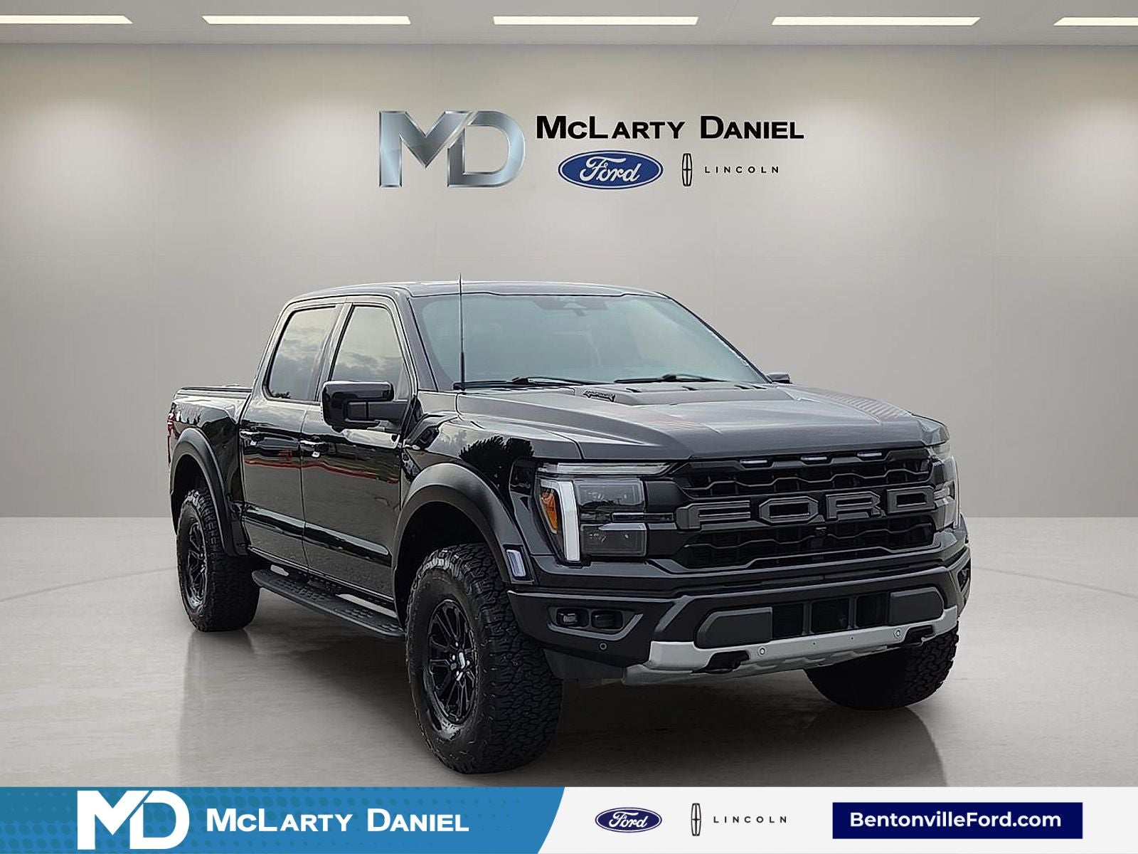 2025 Ford F-150 Raptor in Black Metallic — front three-quarter view
