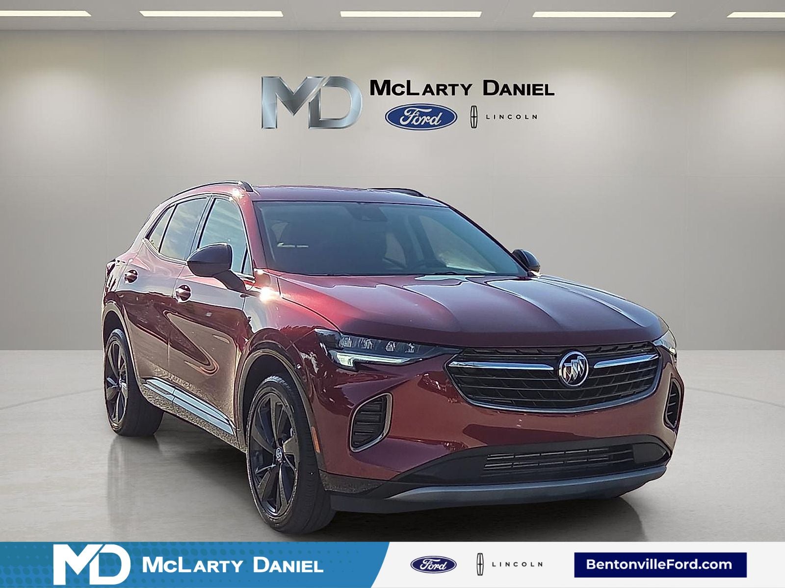 2023 Buick Envision Preferred in Cinnabar Metallic — front three-quarter view