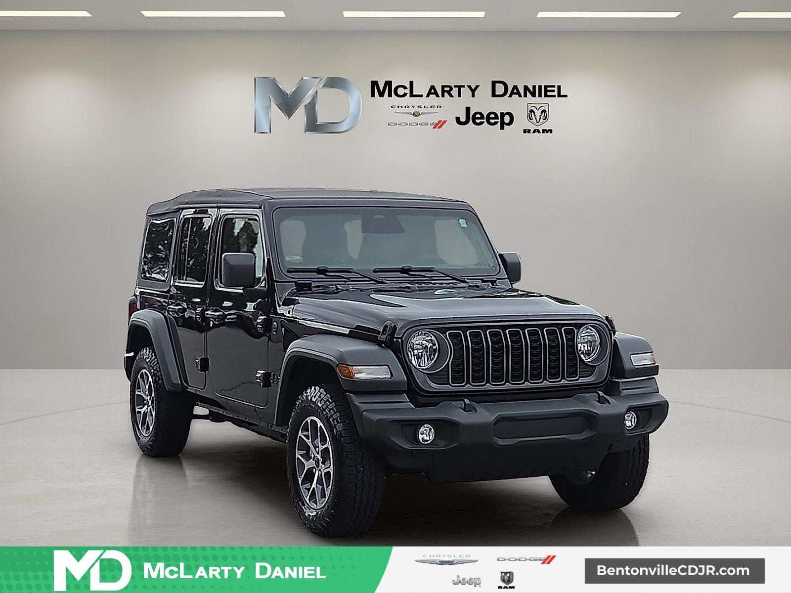2026 Jeep Wrangler WRANGLER 4-DOOR SPORT S in Black Clear-Coat Exterior Paint — front three-quarter view