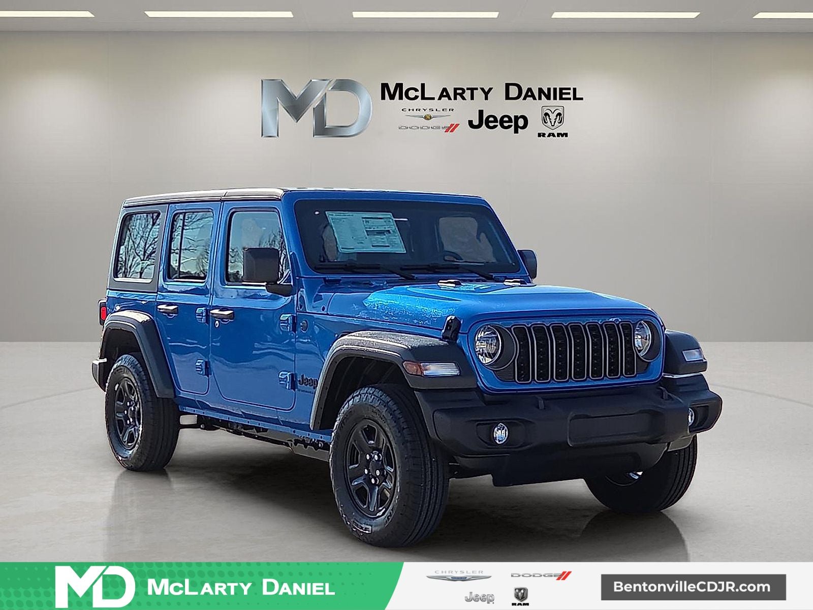 2026 Jeep Wrangler WRANGLER 4-DOOR SPORT in Hydro Blue Pearl-Coat Exterior Paint — front three-quarter view