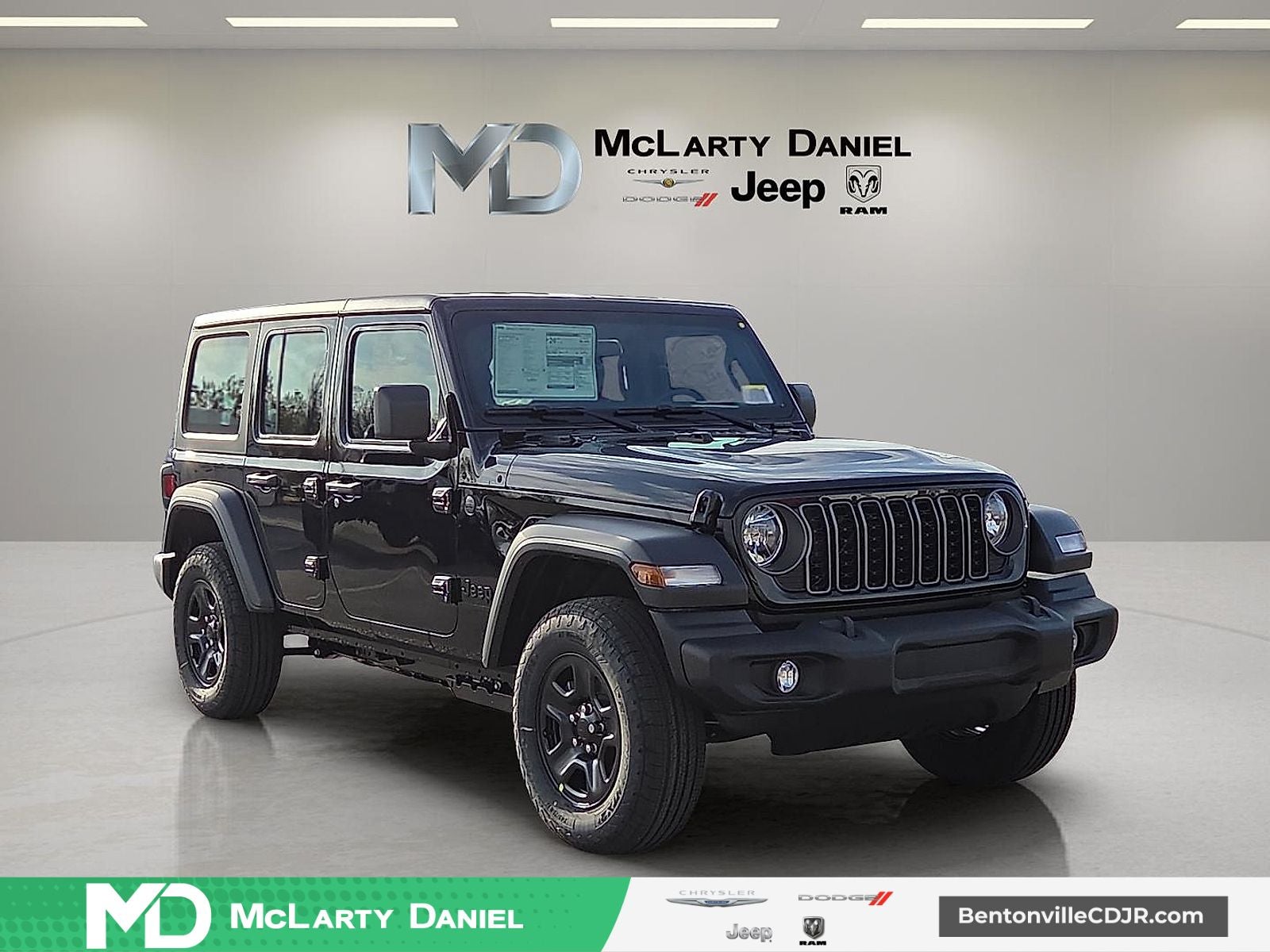 2026 Jeep Wrangler WRANGLER 4-DOOR SPORT in Black Clear-Coat Exterior Paint — front three-quarter view