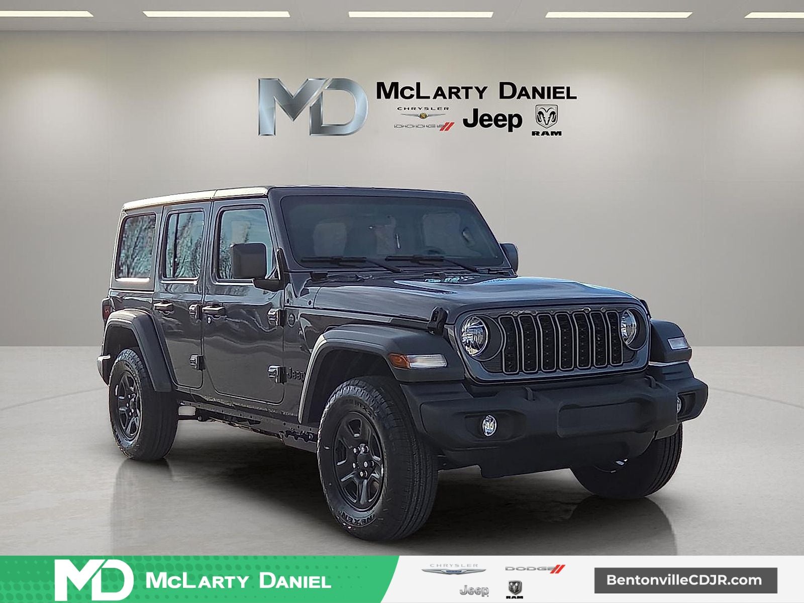 2026 Jeep Wrangler WRANGLER 4-DOOR SPORT in Granite Crystal Metallic Clear-Coat Exterior Paint — front three-quarter view