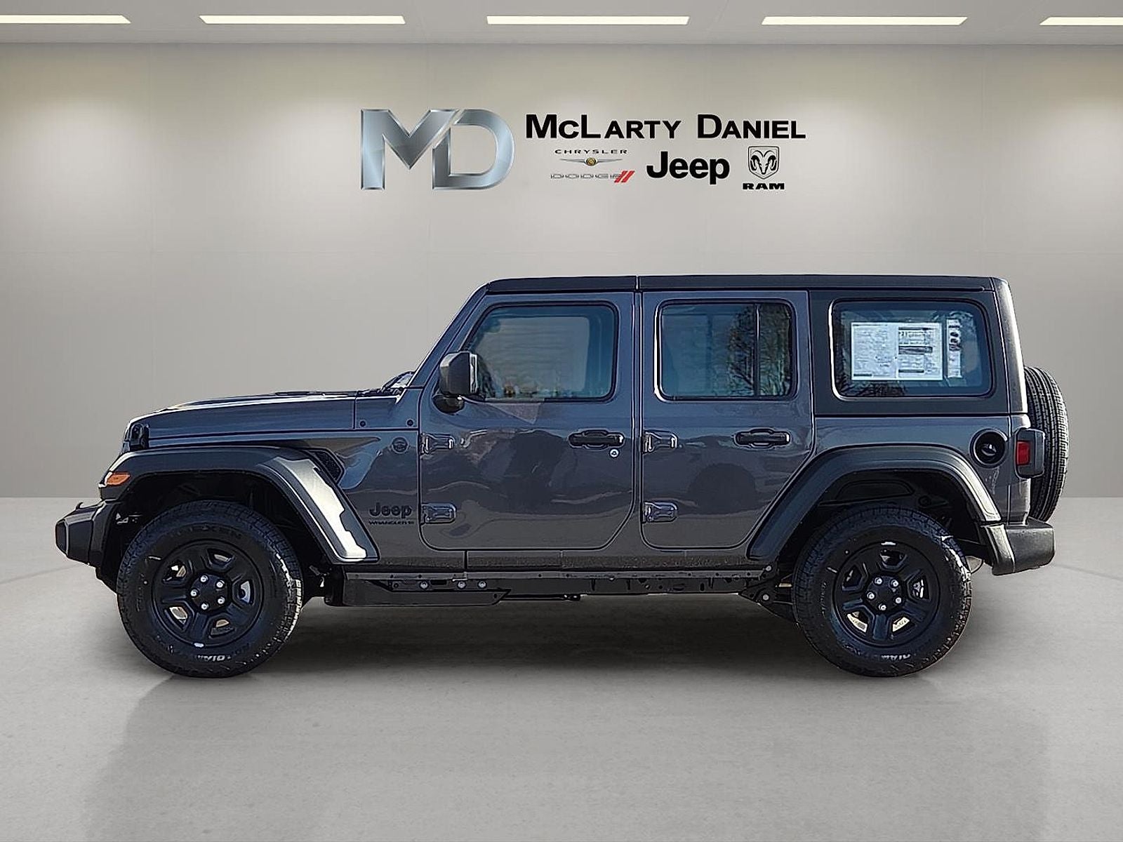 2026 Jeep Wrangler — rear three-quarter view