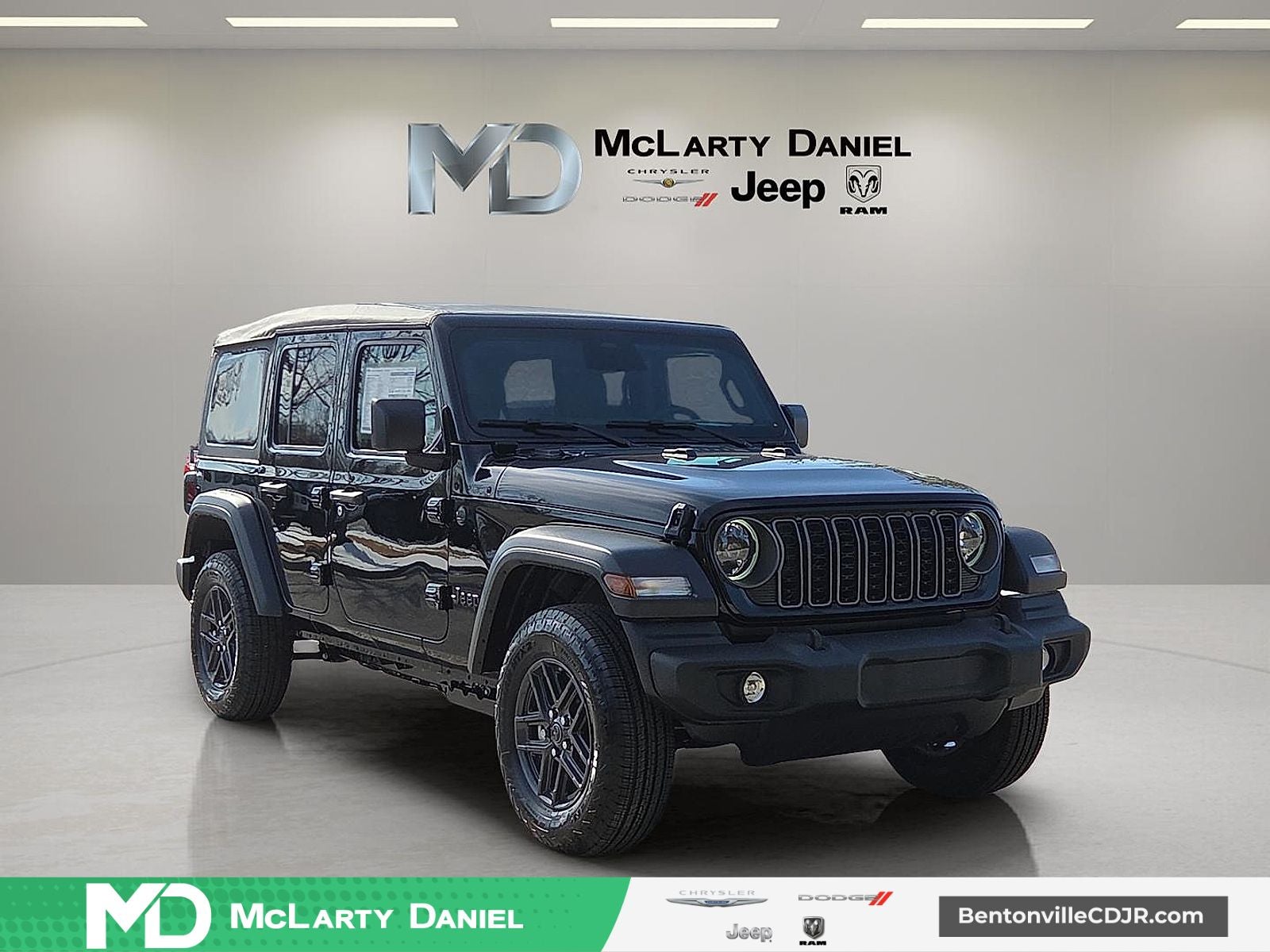 2026 Jeep Wrangler WRANGLER 4-DOOR SPORT S in Black Clear-Coat Exterior Paint — front three-quarter view