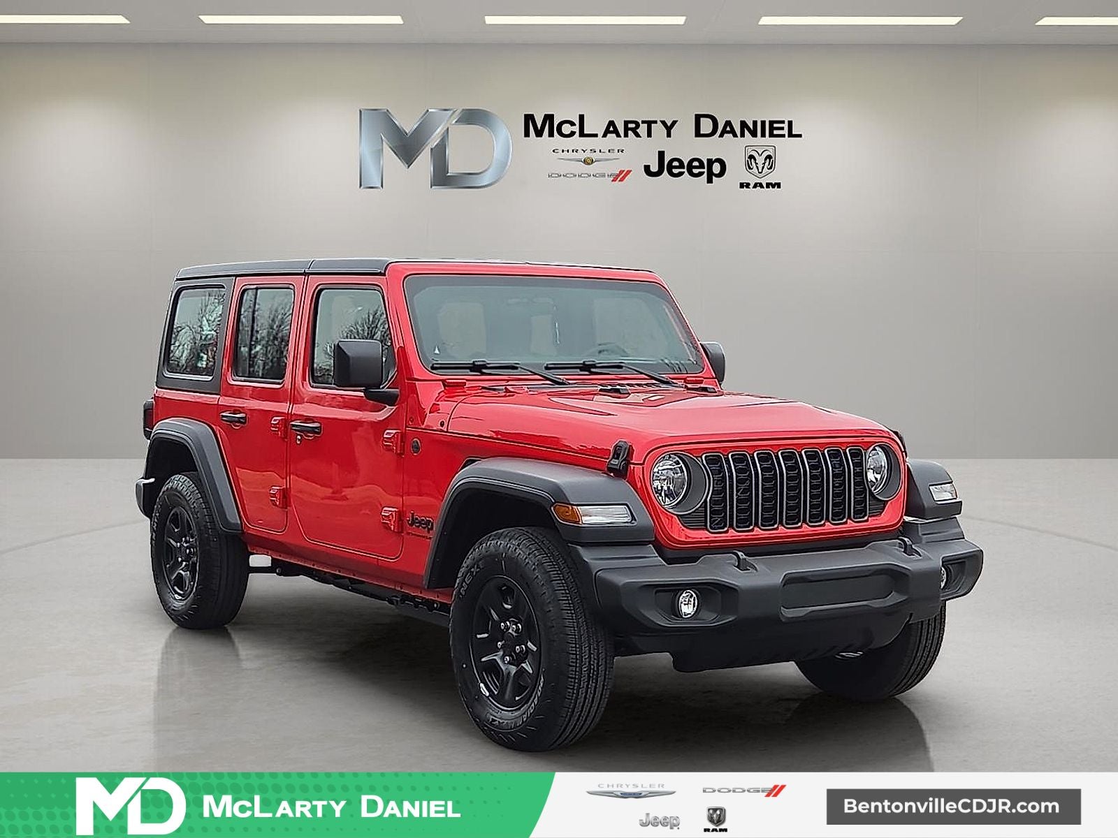2026 Jeep Wrangler WRANGLER 4-DOOR SPORT in Firecracker Red Clear-Coat Exterior Paint — front three-quarter view
