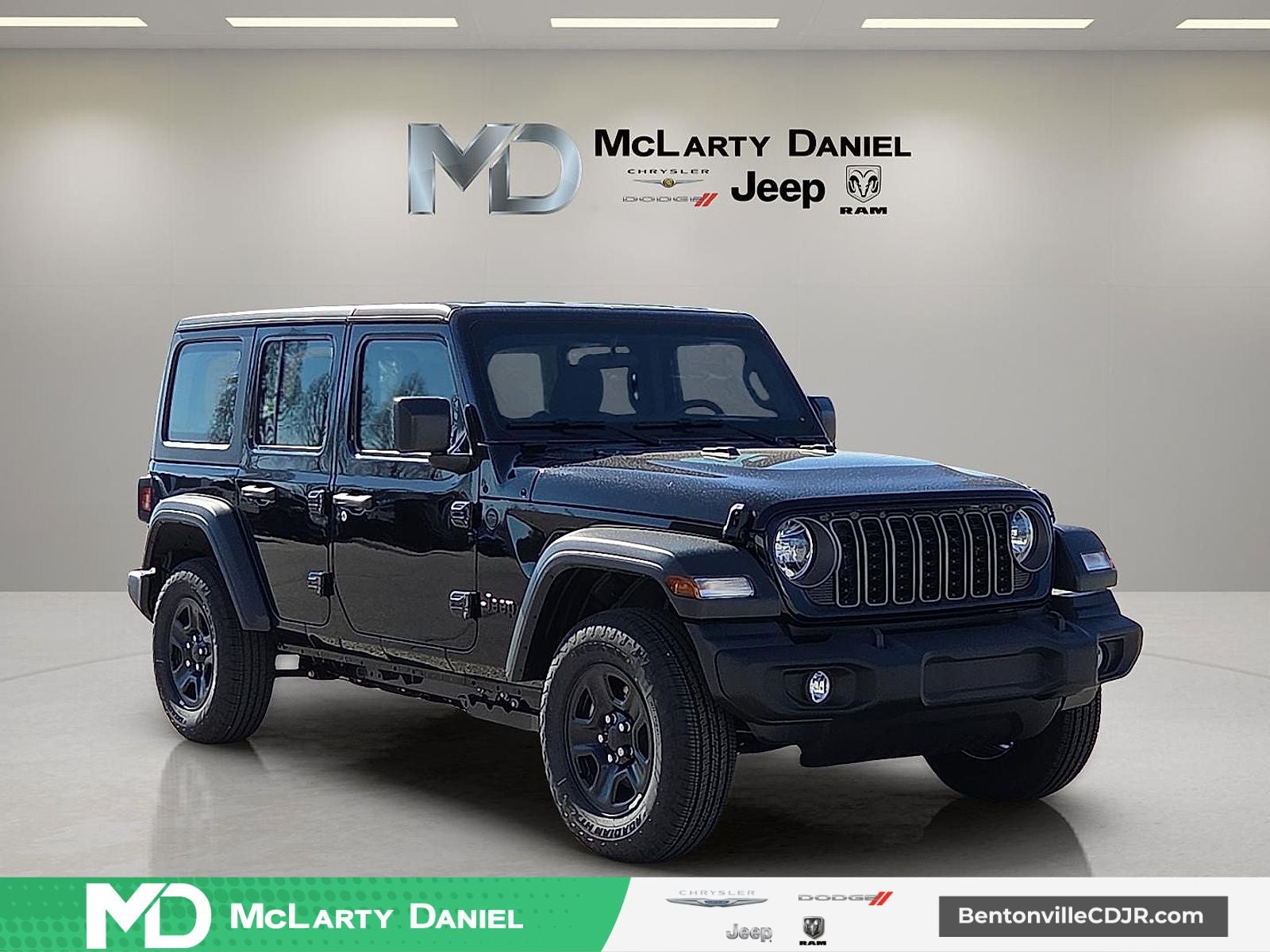 2026 Jeep Wrangler WRANGLER 4-DOOR SPORT in Black Clear-Coat Exterior Paint — front three-quarter view