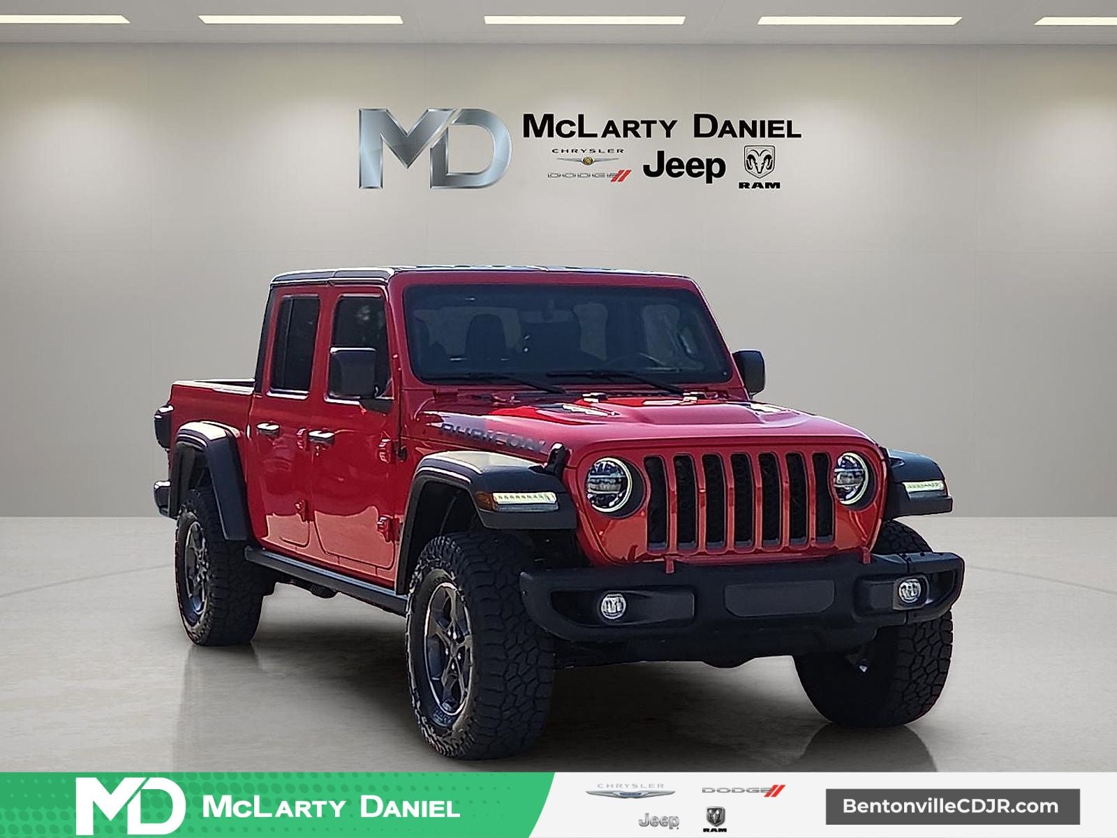 2022 Jeep Gladiator Rubicon 4x4 in Firecracker Red Clearcoat — front three-quarter view