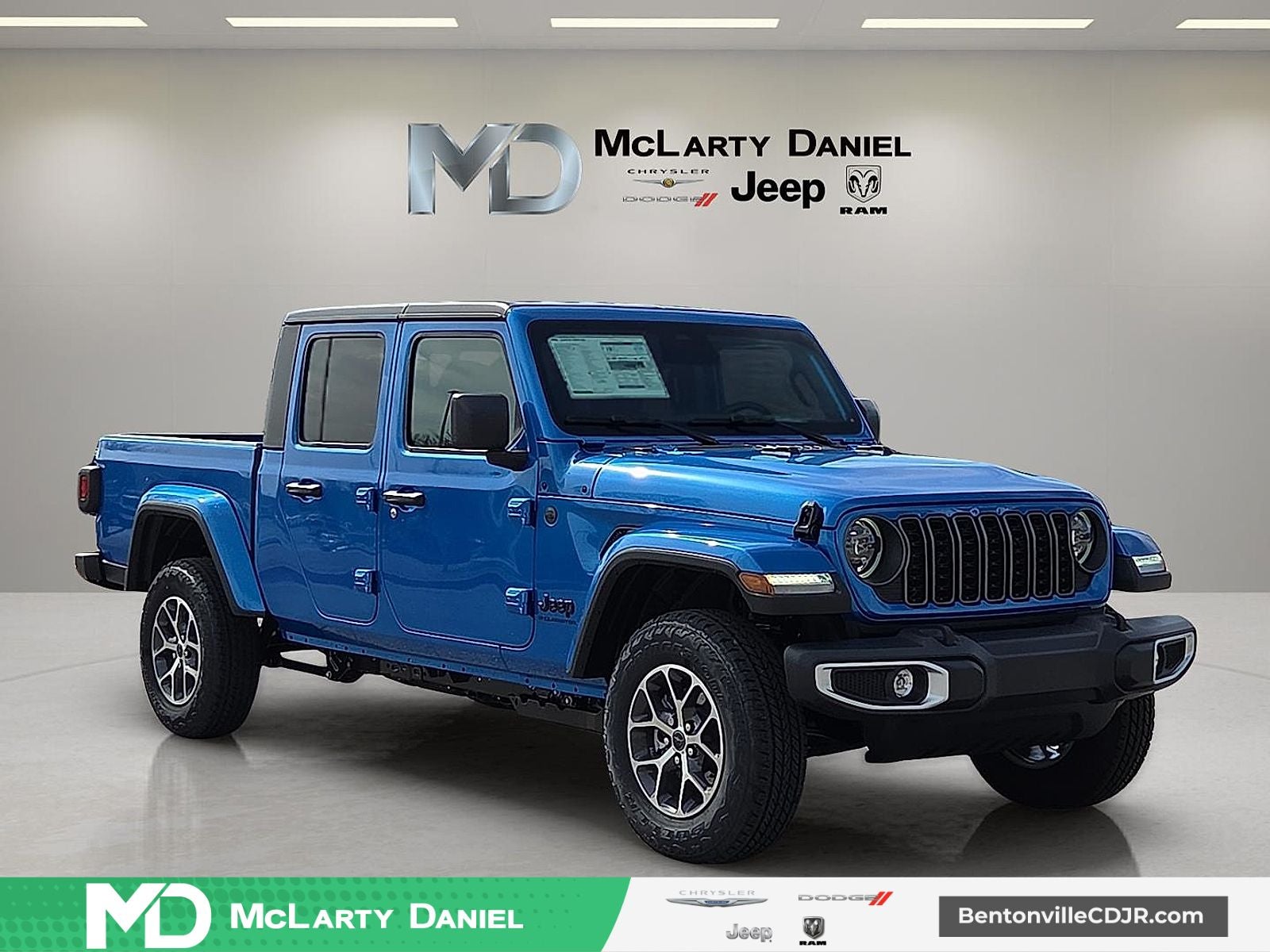 2026 Jeep Gladiator GLADIATOR SPORT S 4X4 in Hydro Blue Pearl-Coat Exterior Paint — front three-quarter view