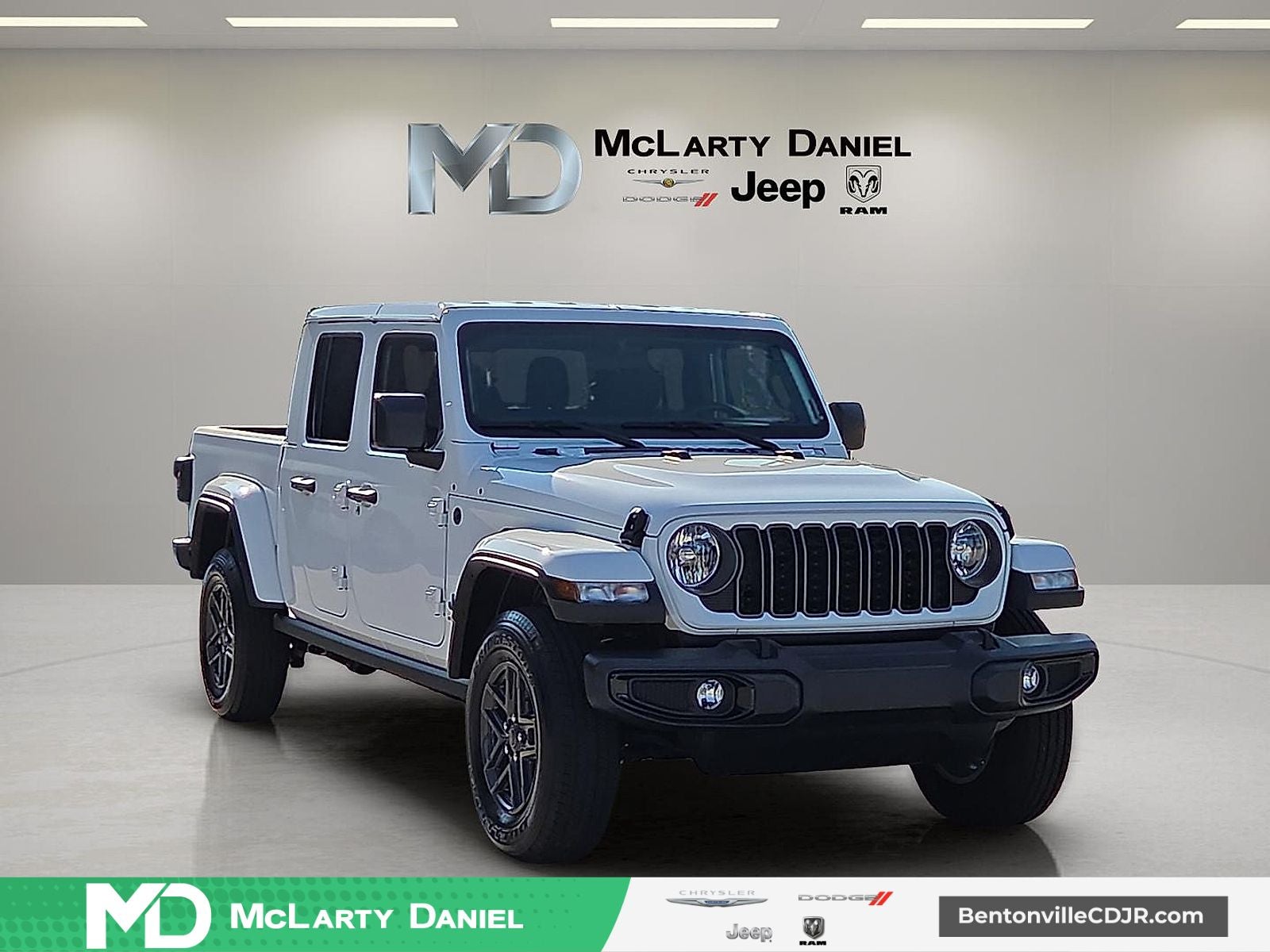 2025 Jeep Gladiator Nighthawk in Bright White Clearcoat — front three-quarter view