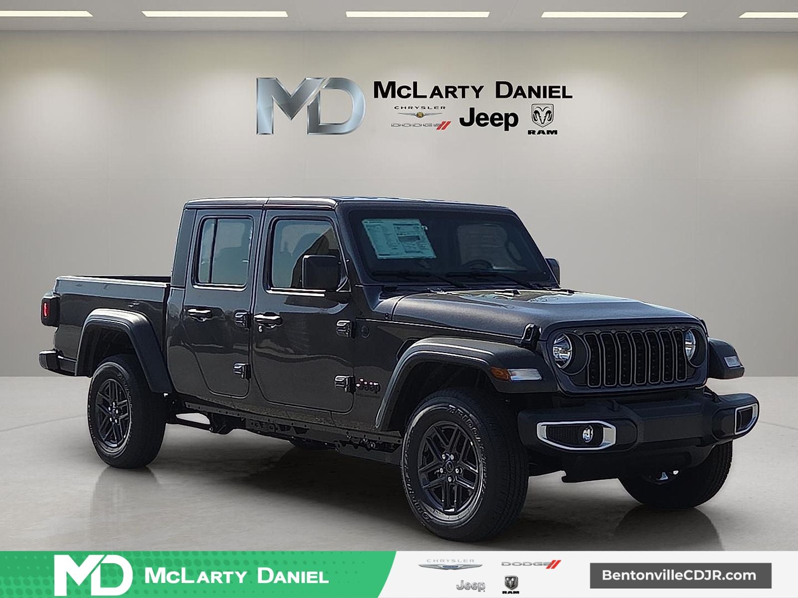 2026 Jeep Gladiator GLADIATOR SPORT 4X4 in Granite Crystal Metallic Clear-Coat Exterior Paint — front three-quarter view