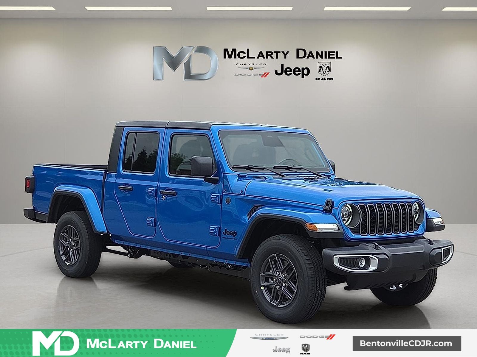 2026 Jeep Gladiator GLADIATOR SPORT S 4X4 in Hydro Blue Pearl-Coat Exterior Paint — front three-quarter view