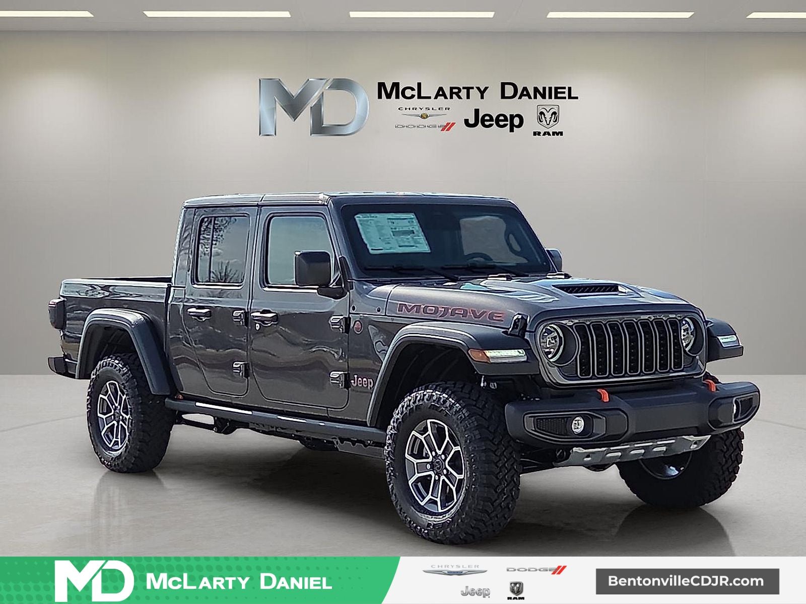 2026 Jeep Gladiator GLADIATOR MOJAVE 4X4 in Granite Crystal Metallic Clear-Coat Exterior Paint — front three-quarter view