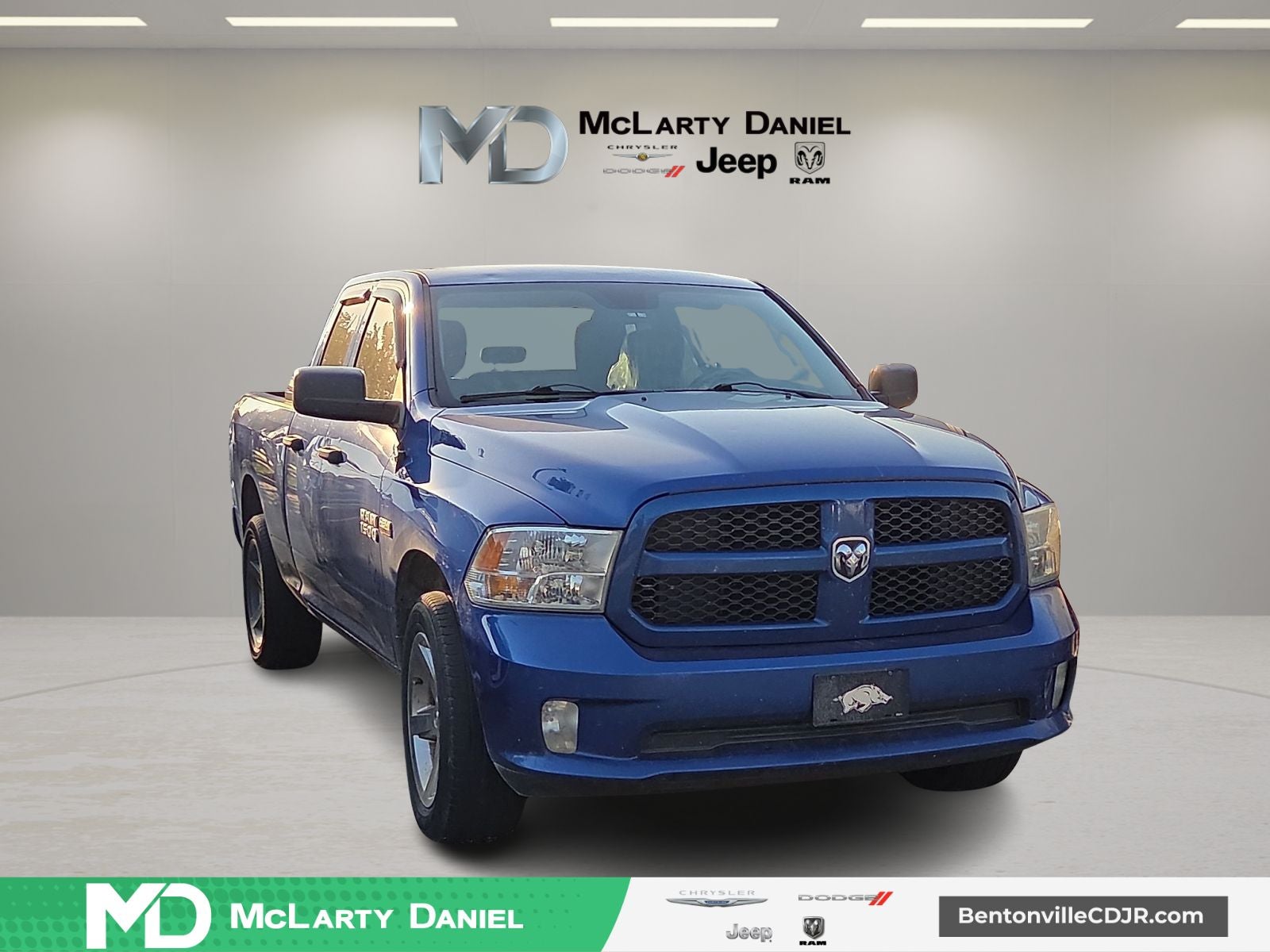 2014 RAM 1500 Express in Blue Streak Pearlcoat — front three-quarter view