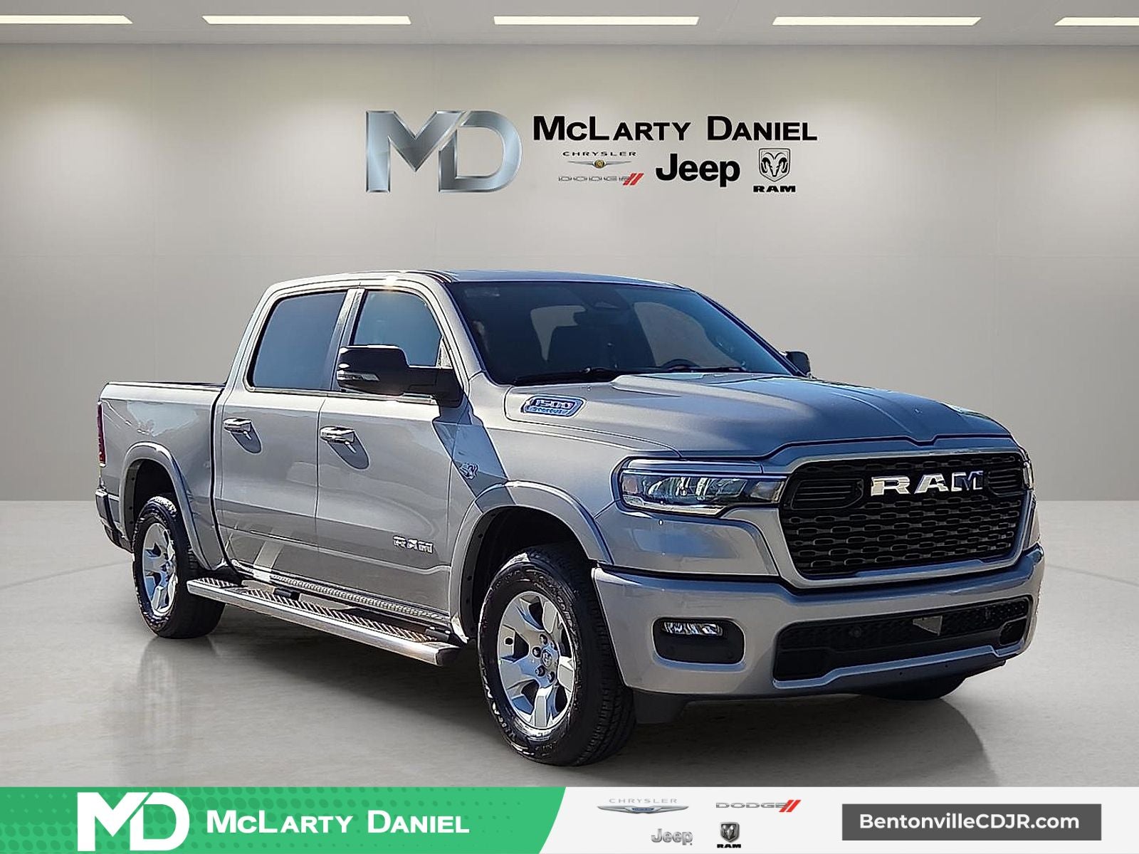 2026 RAM Ram 1500 RAM 1500 BIG HORN CREW CAB 4X4 5'7' BOX in Billet Silver Metallic Clear-Coat Exterior Paint — front three-quarter view