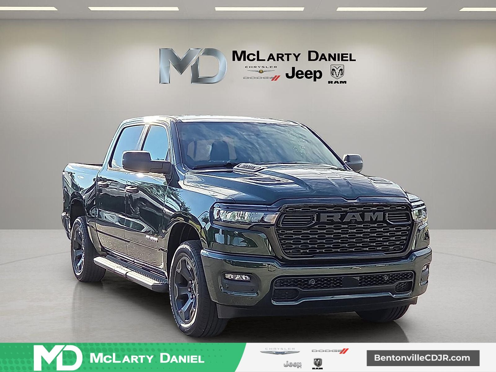 2026 RAM Ram 1500 RAM 1500 EXPRESS CREW CAB 4X4 5'7' BOX in Serrano-Green Metallic Exterior Paint — front three-quarter view