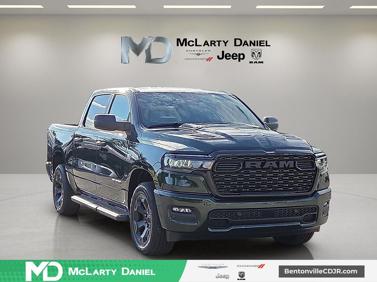 2026 RAM Ram 1500 RAM 1500 EXPRESS CREW CAB 4X4 5'7' BOX in Serrano-Green Metallic Exterior Paint — front three-quarter view