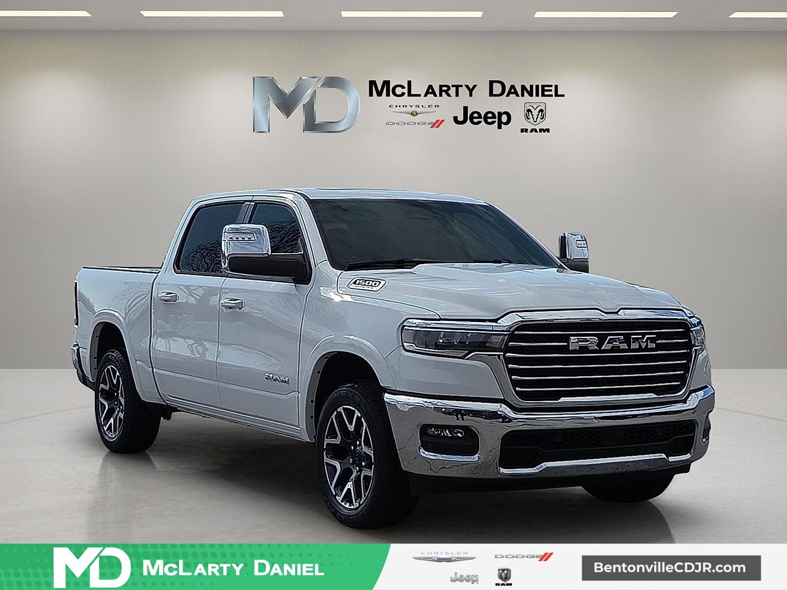 2026 RAM Ram 1500 RAM 1500 LARAMIE CREW CAB 4X4 5'7' BOX in Bright White Clear-Coat Exterior Paint — front three-quarter view