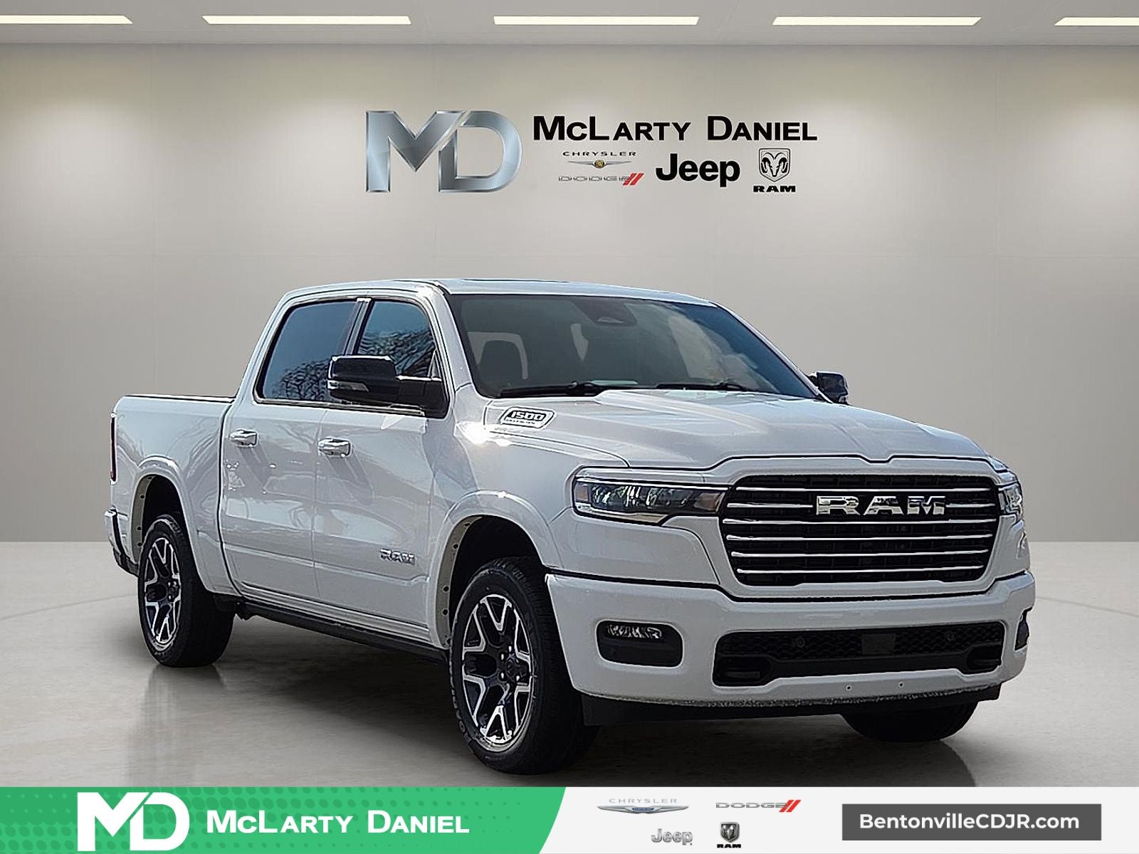 2026 RAM Ram 1500 RAM 1500 LARAMIE CREW CAB 4X4 5'7' BOX in Bright White Clear-Coat Exterior Paint — front three-quarter view