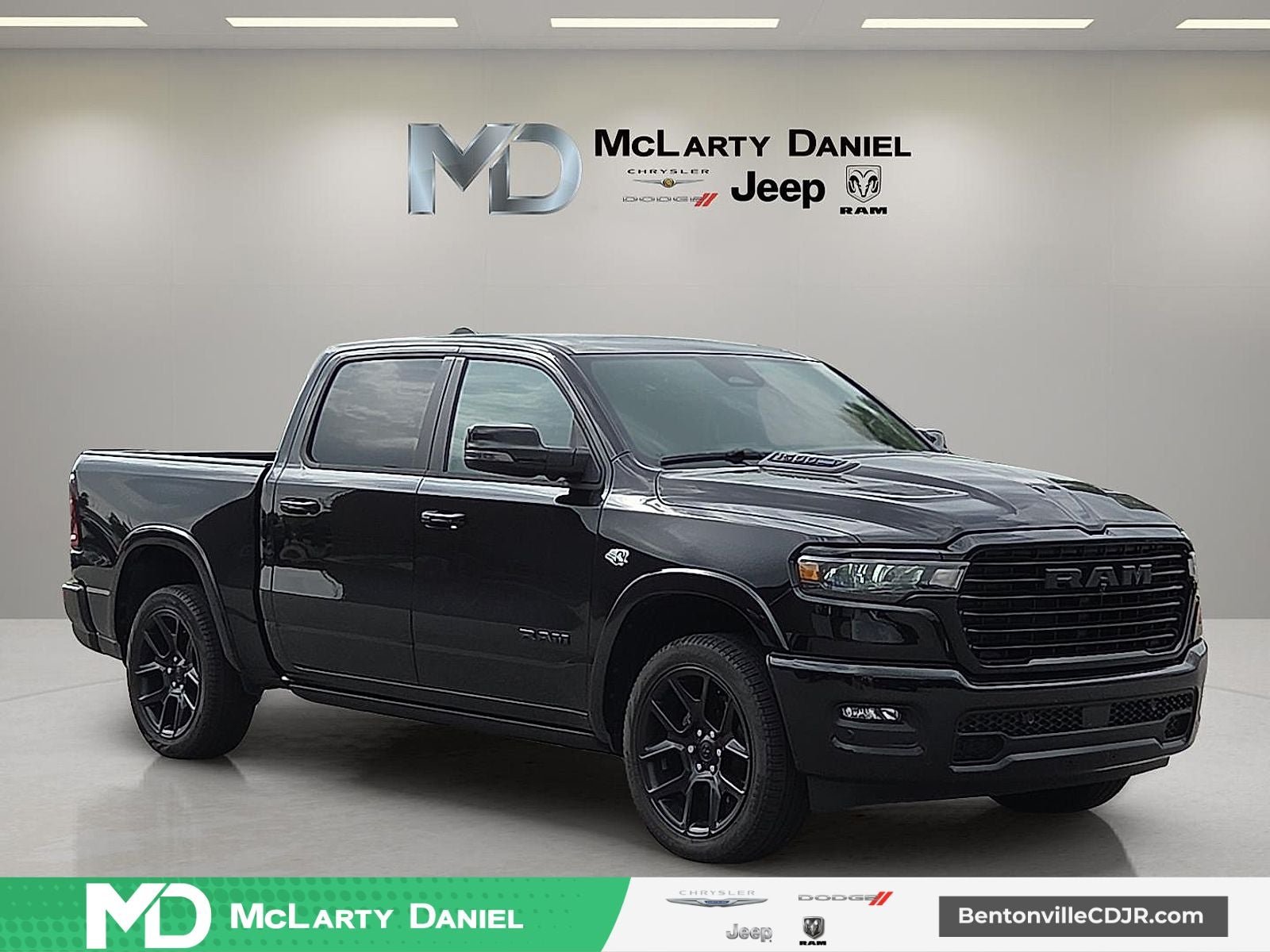 2026 RAM Ram 1500 RAM 1500 LARAMIE CREW CAB 4X4 5'7' BOX in Diamond Black Crystal Pearl-Coat Exterior Paint — front three-quarter view