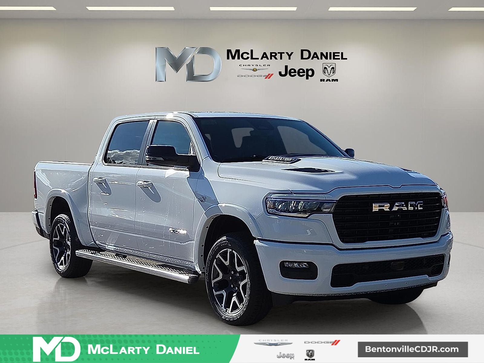 2026 RAM Ram 1500 RAM 1500 LARAMIE CREW CAB 4X4 5'7' BOX in Bright White Clear-Coat Exterior Paint — front three-quarter view