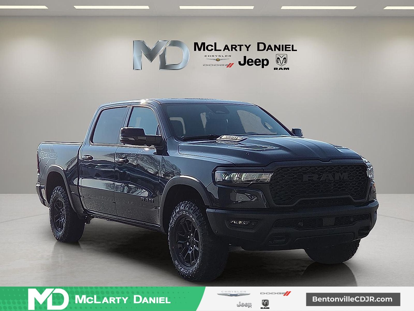 2026 RAM Ram 1500 RAM 1500 REBEL CREW CAB 4X4 5'7' BOX in Forged Blue Metallic Exterior Paint — front three-quarter view