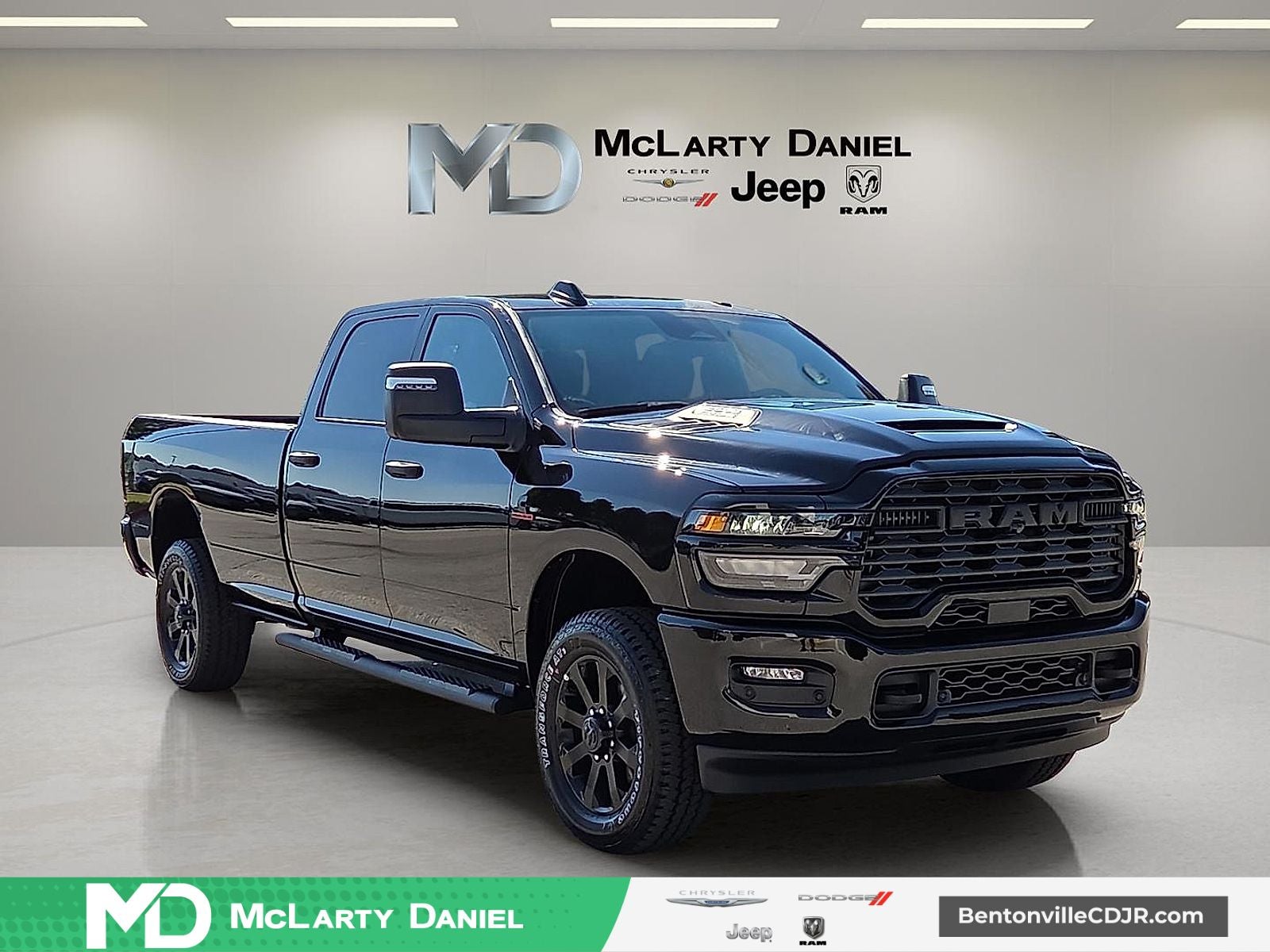 2026 RAM Ram 2500 RAM 2500 BLACK EXPRESS CREW CAB 4X4 8' BOX in Diamond Black Crystal Pearl-Coat Exterior Paint — front three-quarter view