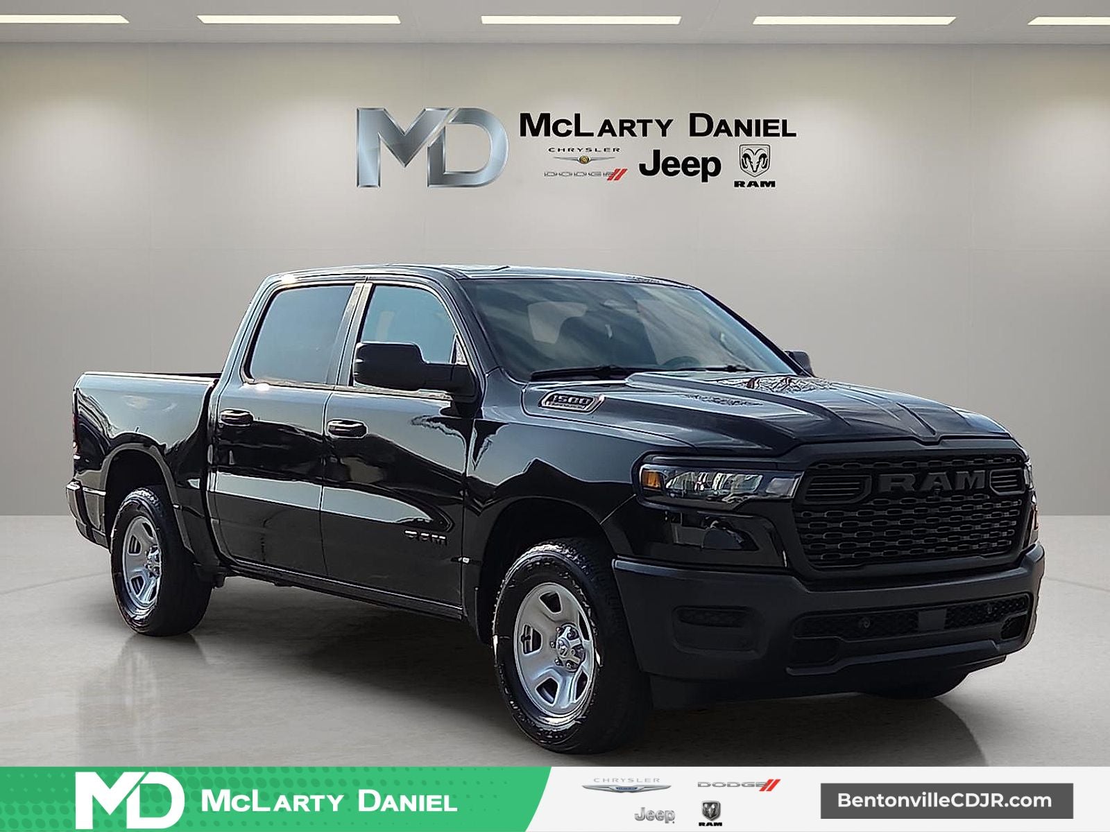 2026 RAM Ram 1500 RAM 1500 TRADESMAN CREW CAB 4X4 5'7' BOX in Diamond Black Crystal Pearl-Coat Exterior Paint — front three-quarter view