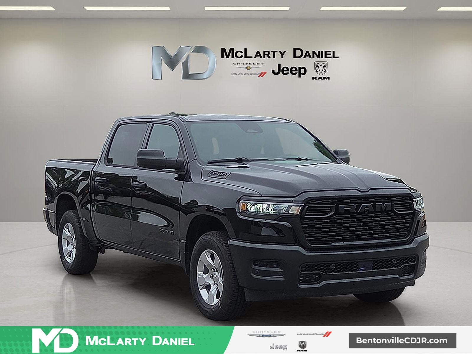 2026 RAM Ram 1500 RAM 1500 TRADESMAN CREW CAB 4X4 5'7' BOX in Diamond Black Crystal Pearl-Coat Exterior Paint — front three-quarter view