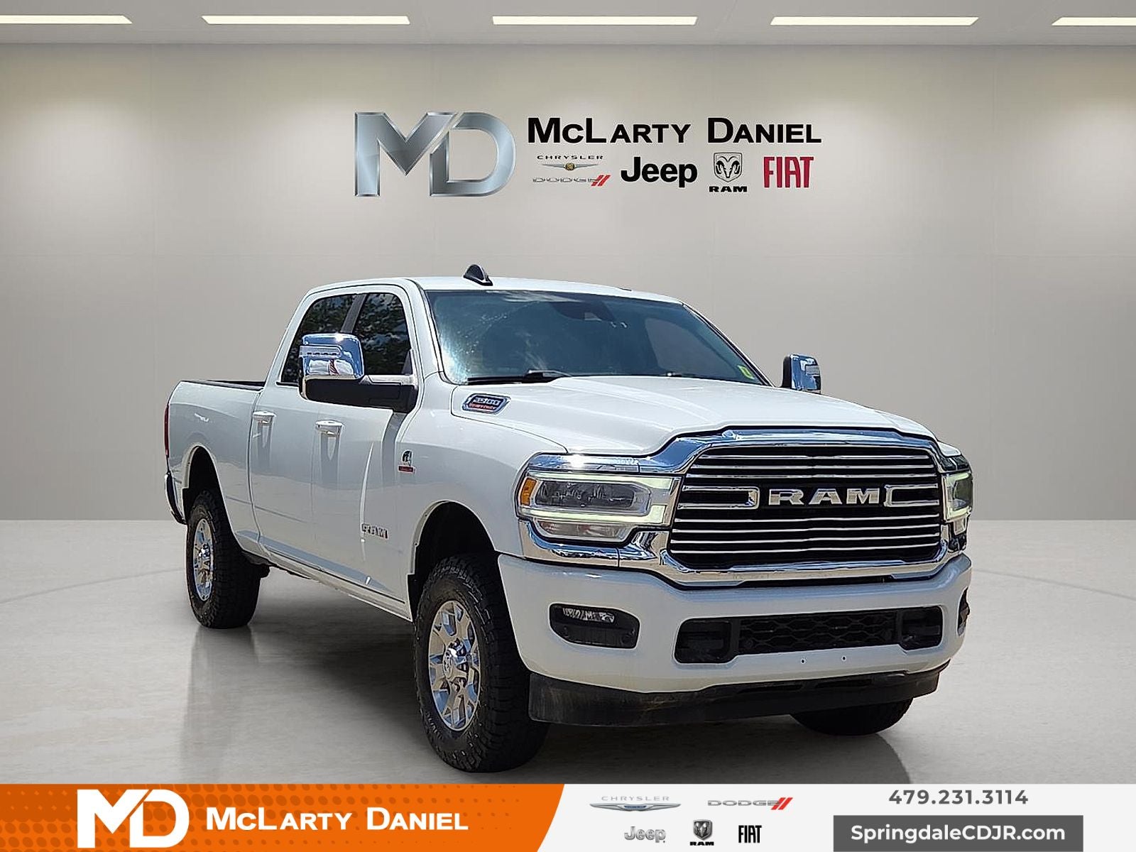 2024 RAM 2500 Laramie Crew Cab 4x4 6'4' Box in Bright White Clearcoat — front three-quarter view