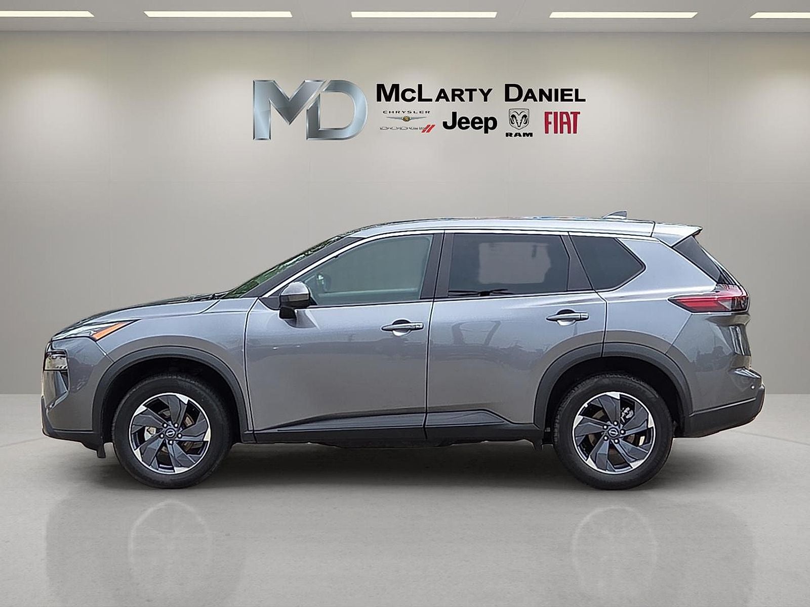 2025 Nissan Rogue — rear three-quarter view