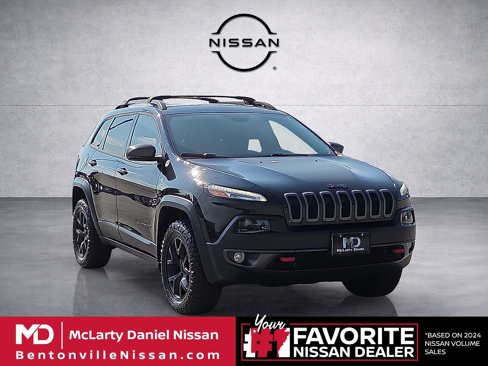 2016 Jeep Cherokee Trailhawk in Brilliant Black Crystal Pearlcoat — front three-quarter view