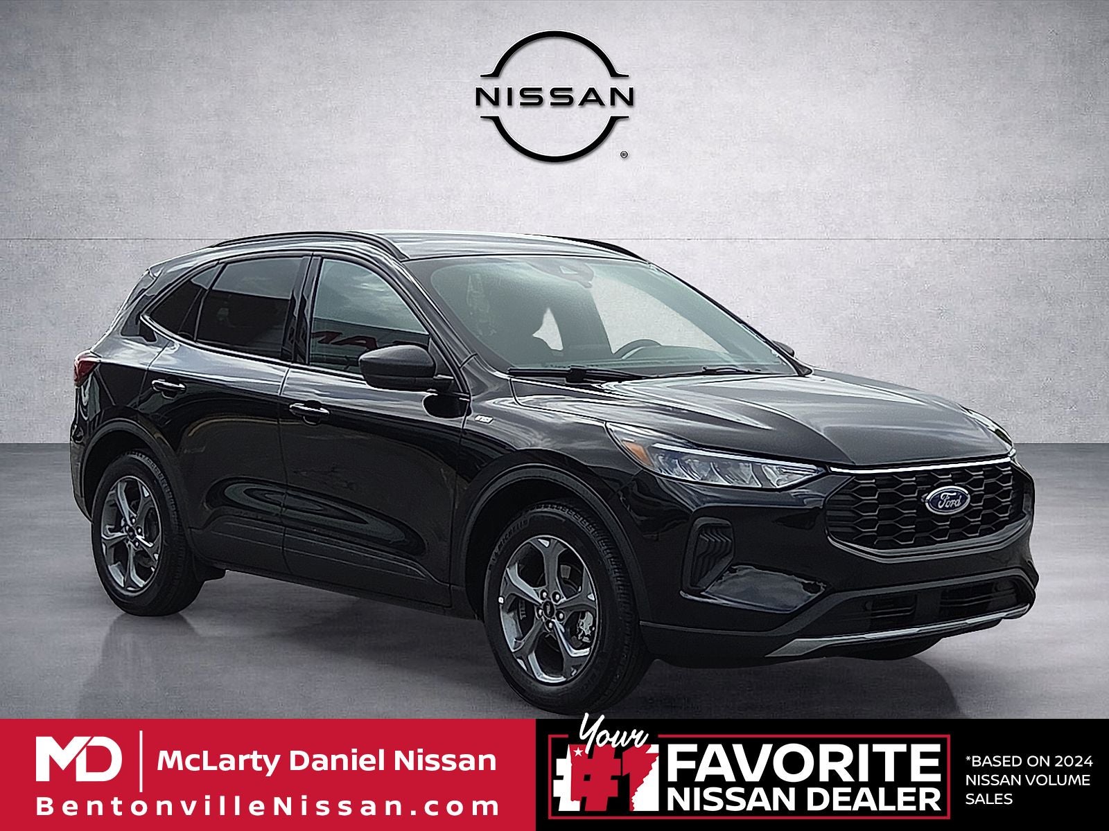 2025 Ford Escape ST-Line in Agate Black Metallic — front three-quarter view